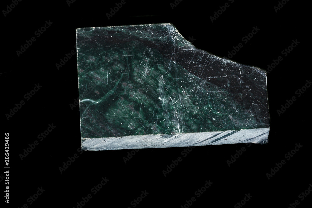 Fototapeta premium Macro stone Nephrite mineral on black background