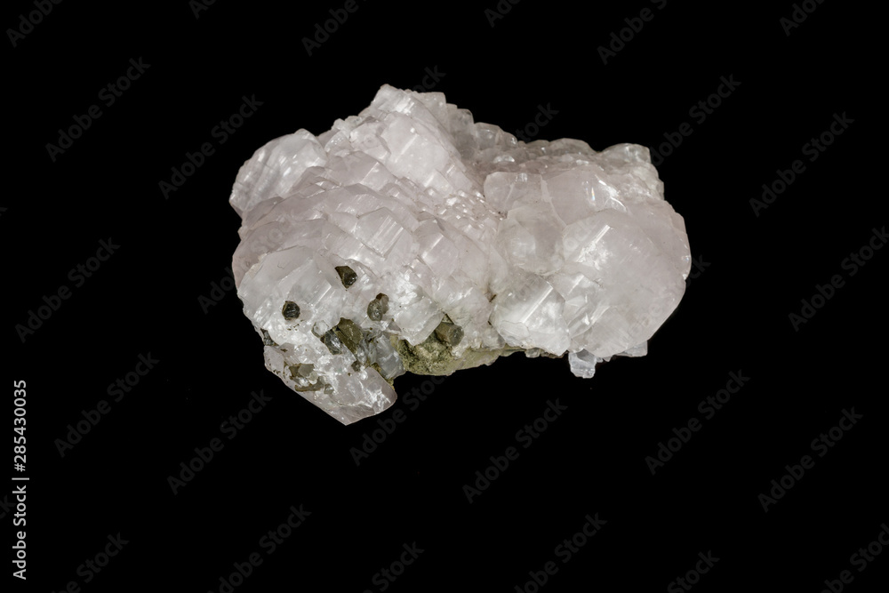 Macro stone Calcite mineral on a black background Macro stone Calcite mineral on a black background