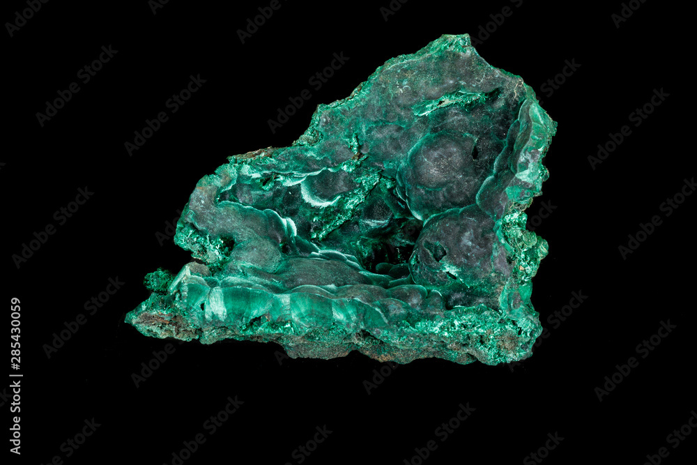 Macro of a mineral stone Malachite on a black background Macro of a mineral stone Malachite on a black background