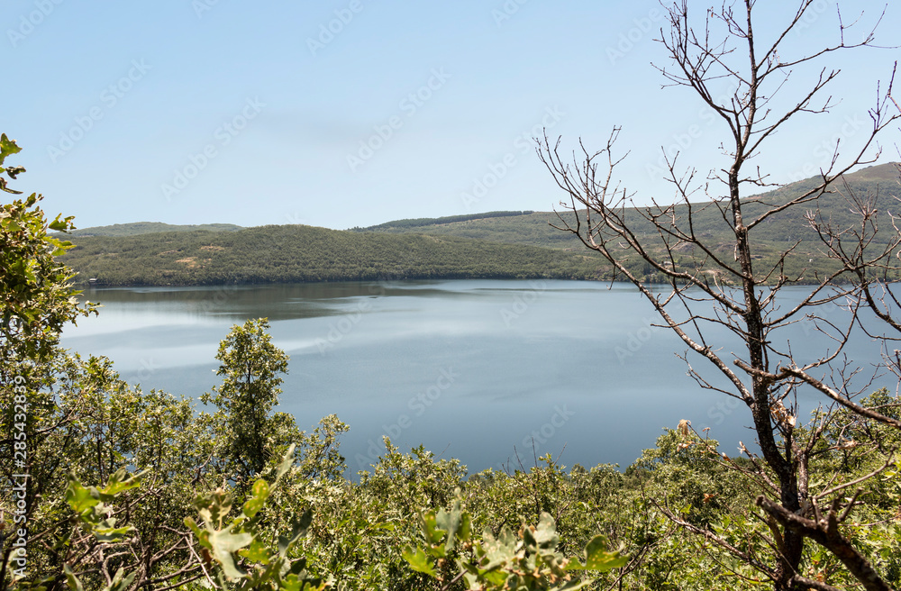 Views of the beautiful and popular lake of Sanabria, of glacial origin located in the province of Zamora, during the summer