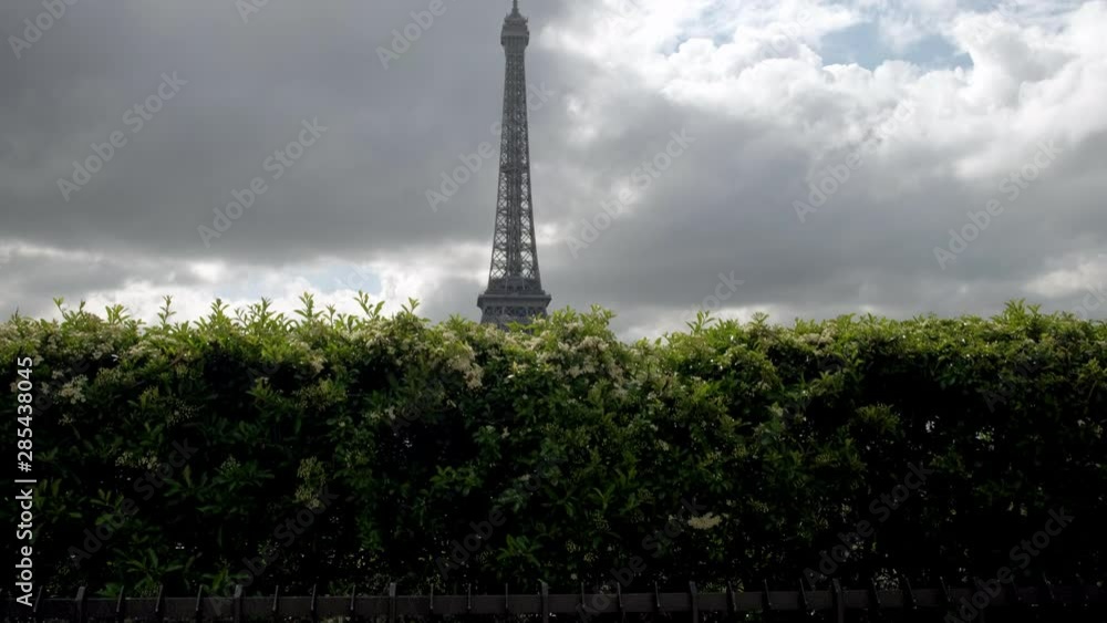 Camera descends behind hedge at Trocadero from the Eiffel Tower Camera descends behind hedge at Trocadero from the Eiffel Tower