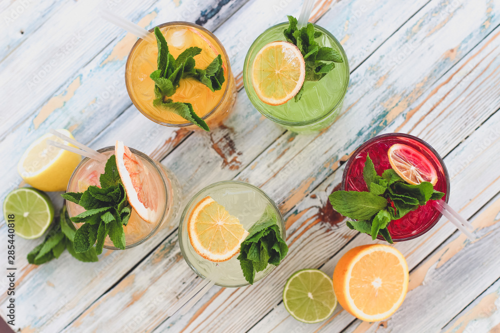 fresh fruit and vegetable juice on wooden background fresh fruit and vegetable juice on wooden background