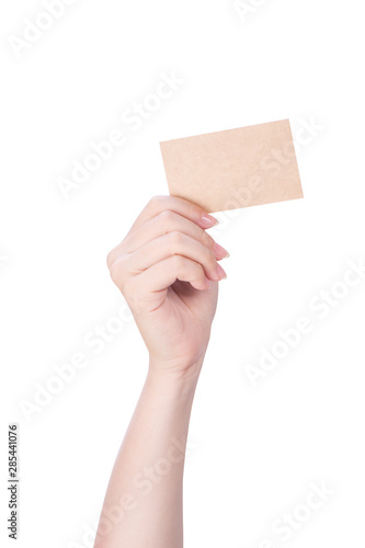 Young asia clean girl hand holding a blank kraft brown paper card template isolated on white background, clipping path, close up, mock up, cut out