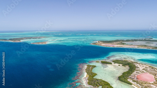 isla de locos Caribbean: Vacation in the blue sea and deserted islands. Aerial view of a blue sea with crystal water. Great landscape. Beach scene. Aerial View Island Landscape Los Roques © GARSPHOTO