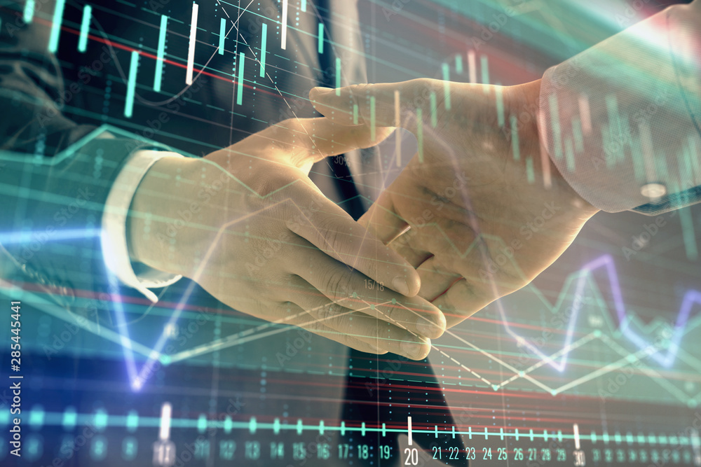 Multi exposure of forex graph on abstract background with two businessmen handshake. Concept of success on stock market Multi exposure of forex graph on abstract background with two businessmen handshake. Concept of success on stock market