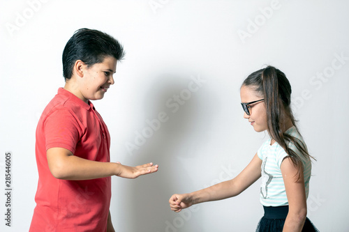 Children play. Rock, paper, scissors