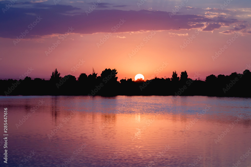 Colorful sunset in the lagoon, Villafranca de los Caballeros, Toledo, Spain