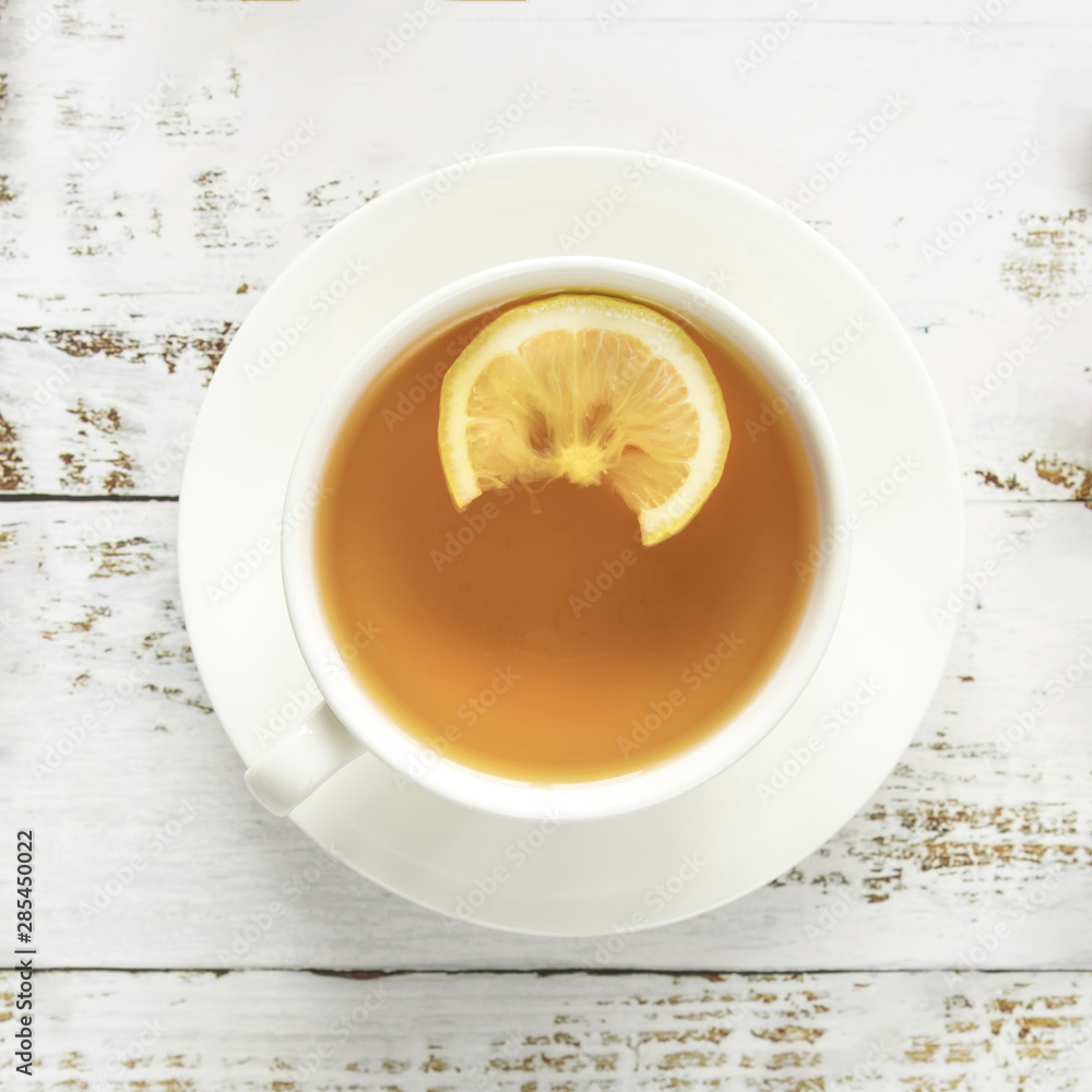 Cup of hot tea on wooden surface Cup of hot tea on wooden surface
