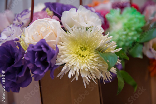 white, purple roses . Purple, white, yellow flowers. Purple, white, yellow flower bouquet .
