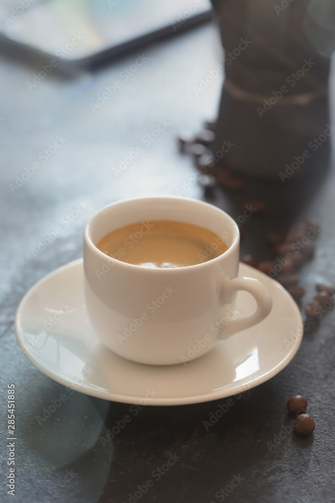 Hot cup of espresso coffee on a table Hot cup of espresso coffee on a table