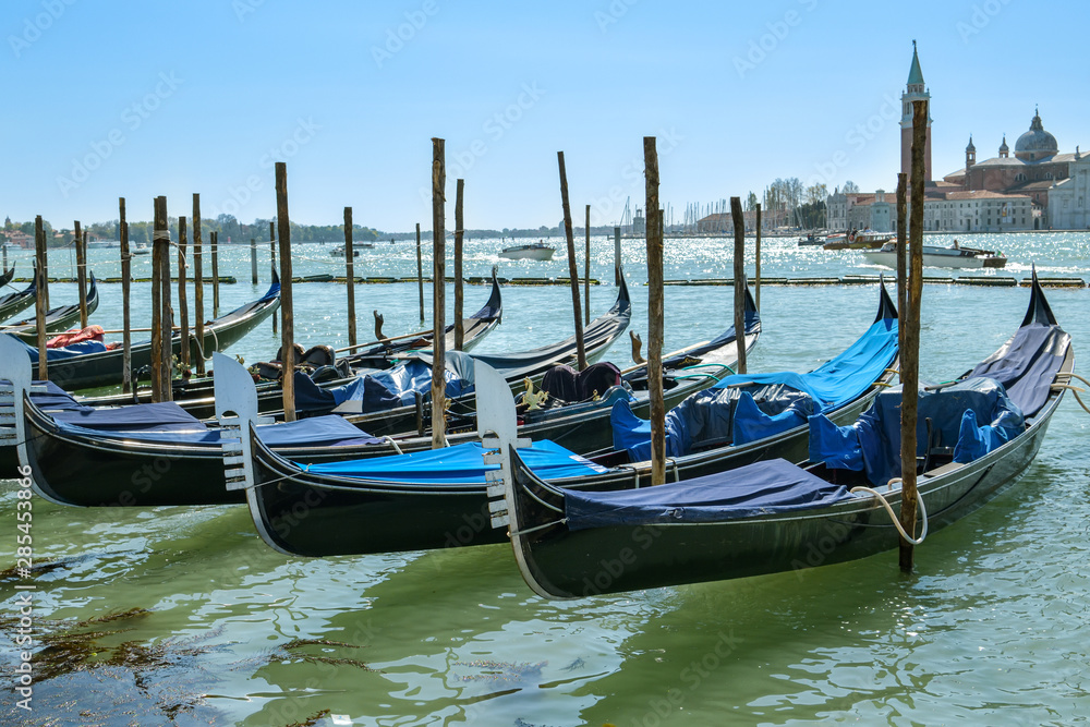  Couple of Gondolas parked close to San Marco Square in Venice