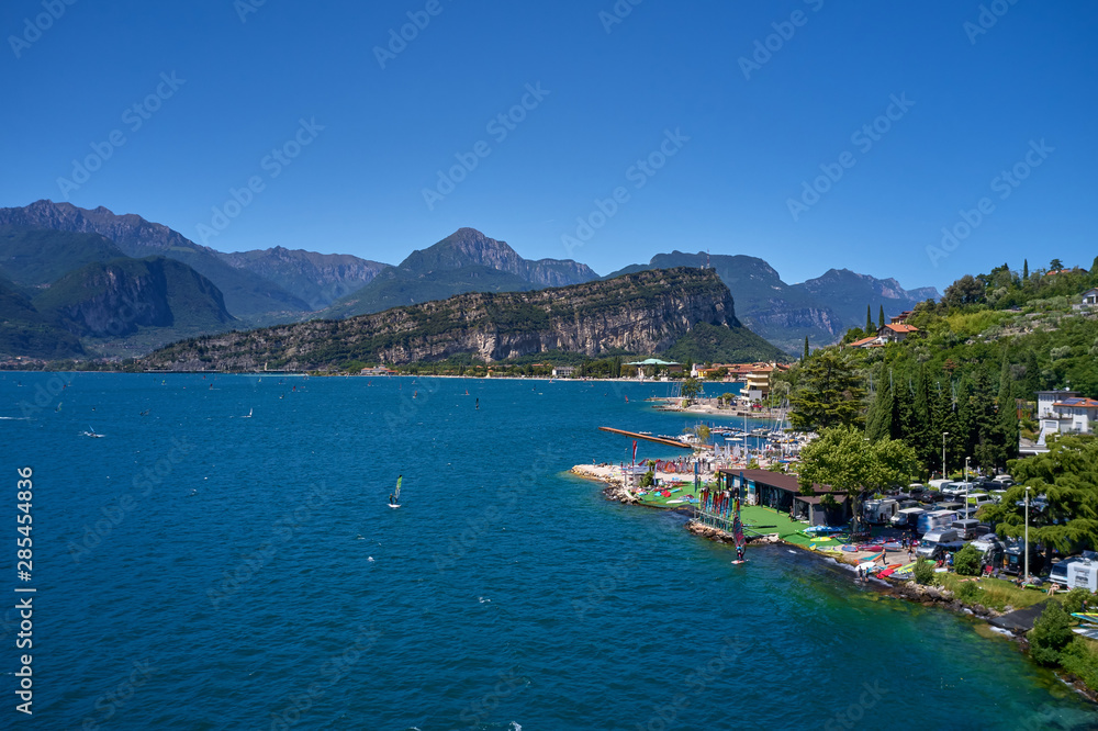 Panorama of Lake Garda surrounded by mountains in Riva del Garda, Italy. Lake Garda Italy. Aerial view