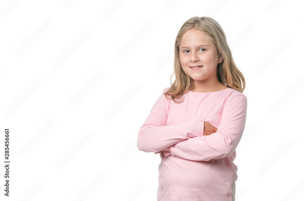 Eight year old blond little girl smiling and with her arms crossed on white background Eight year old blond little girl smiling and with her arms crossed on white background