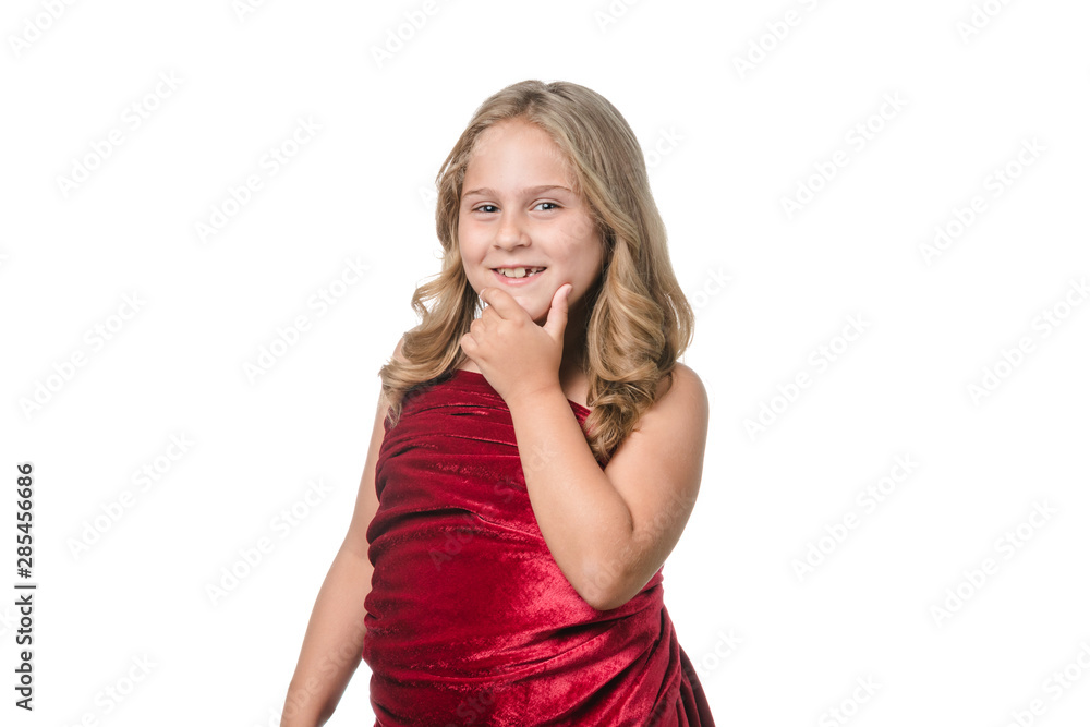 Little girl posing with red velvet dress on white background Little girl posing with red velvet dress on white background