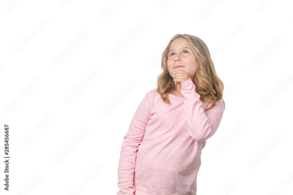 Portrait of a blonde little girl pensive on the white background Portrait of a blonde little girl pensive on the white background
