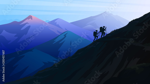 Hiking and camping concept. Silhouette of tourists climbing to the top of the Swiss or Austrian Alps. Dark blue mountains. Amazing Foggy layered landscape. People on the background of nature.