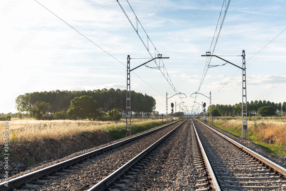 The tracks of a train on a sunny day in León (Spain)