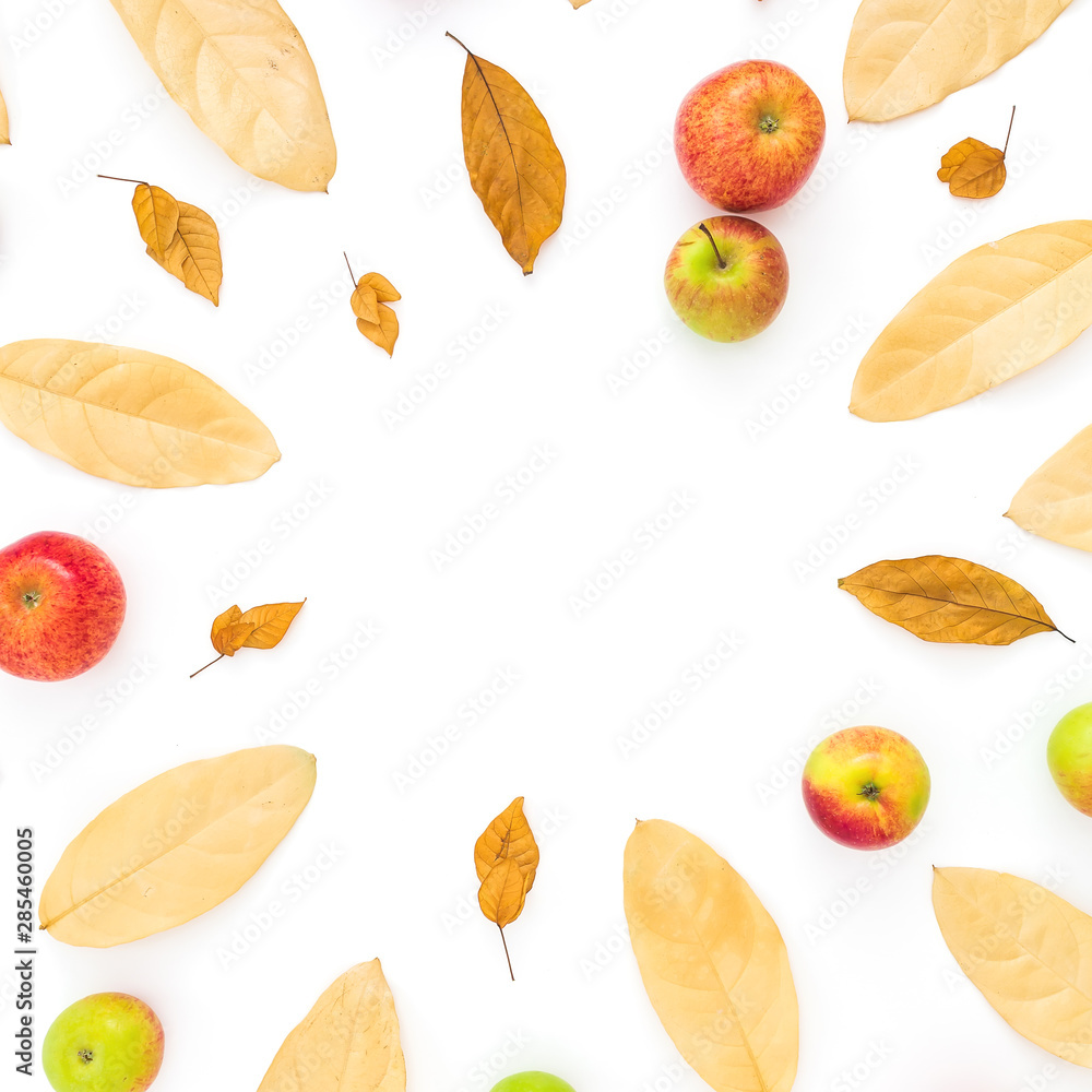 Thanksgiving composition. Frame of autumn fall leaves and apple fruits on white background. Flat lay, top view, copy space
