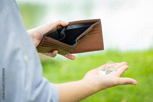 Принти на полотні Closeup hand of asian businesswoman holding her wallet,hand open an empty wallet