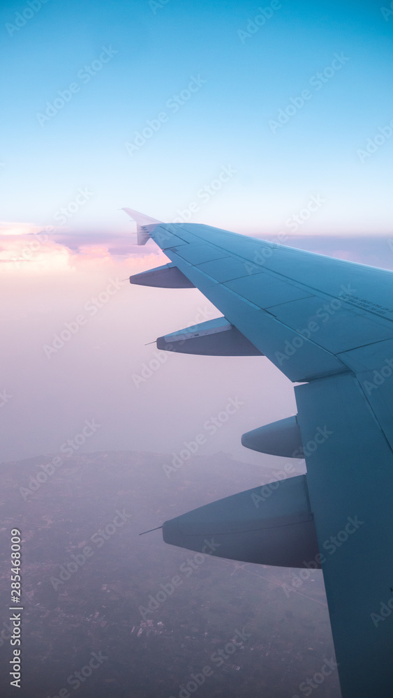 Fototapeta premium Plane wing air clouds. Transport, transportation. Holidays.