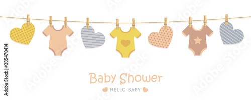 baby shower welcome greeting card for childbirth with hanging hearts and bodysuits vector illustration EPS10