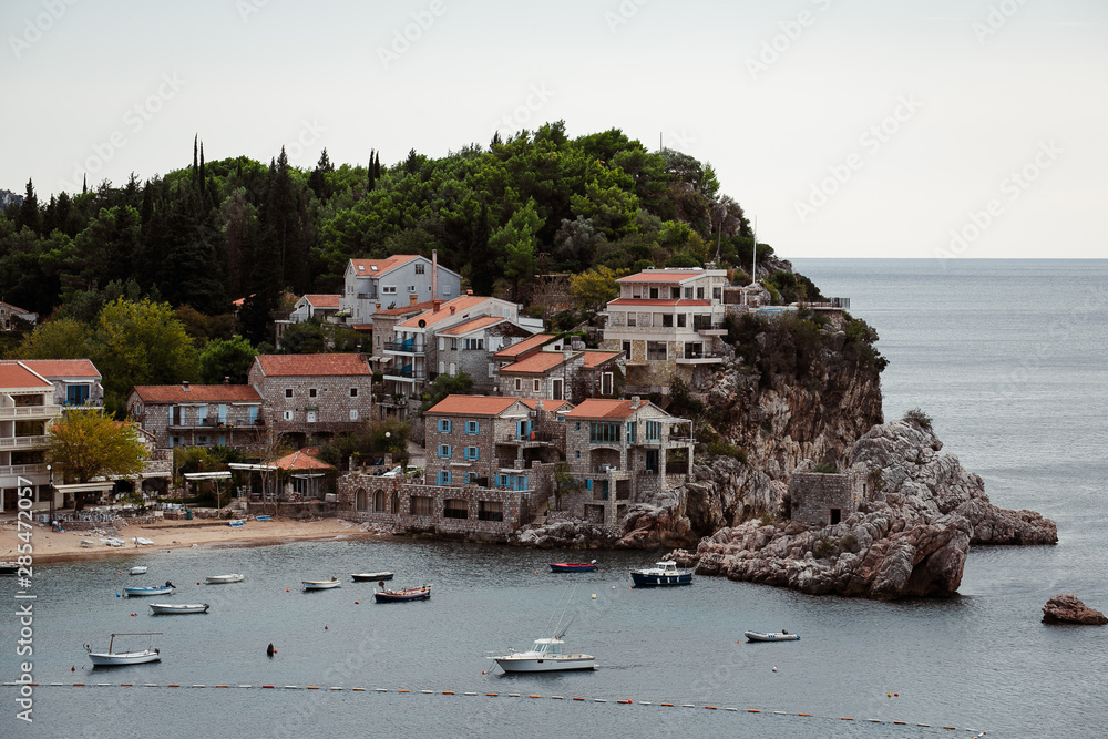houses on a cliff above the sea