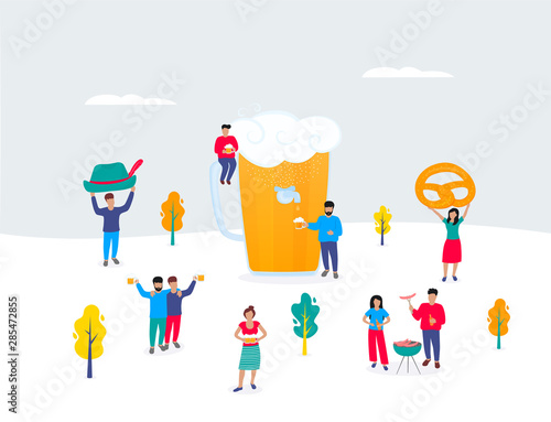 Oktoberfest - German festival. A huge glass of beer. Tiny men and women have a drink and a barbecue. Autumn outdoor scene