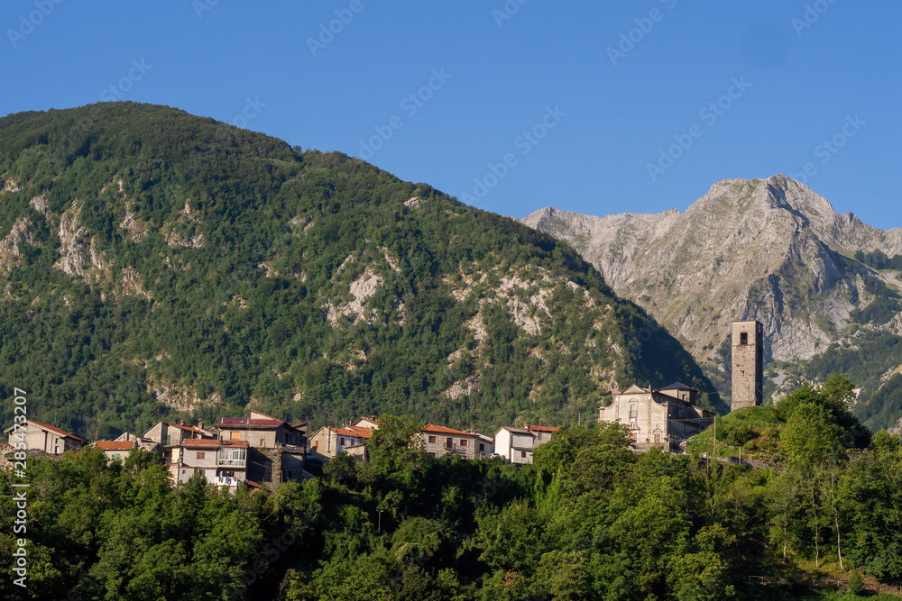 Vagli Sopra village with Apuan Alps behind. Garfagnana area of Italy.
