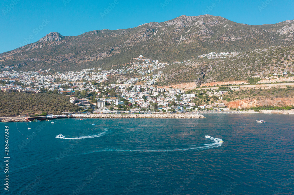 Beautiful scenery from sea to the land. Green hills and mountains shot with drone