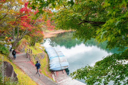 green pond and colorful forest, red leaf in Goshiki numa autumn