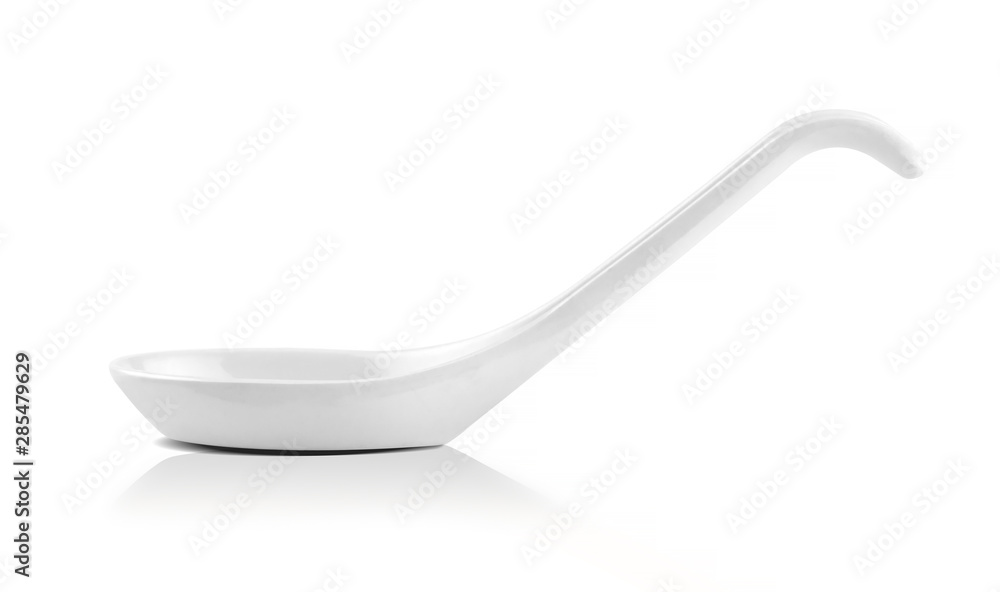 Ceramic white spoon isolated on white background. Side view Ceramic white spoon isolated on white background. Side view