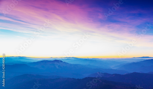 Mountain landscape in the morning with the rising sun in Eastern Carpathians, Romania