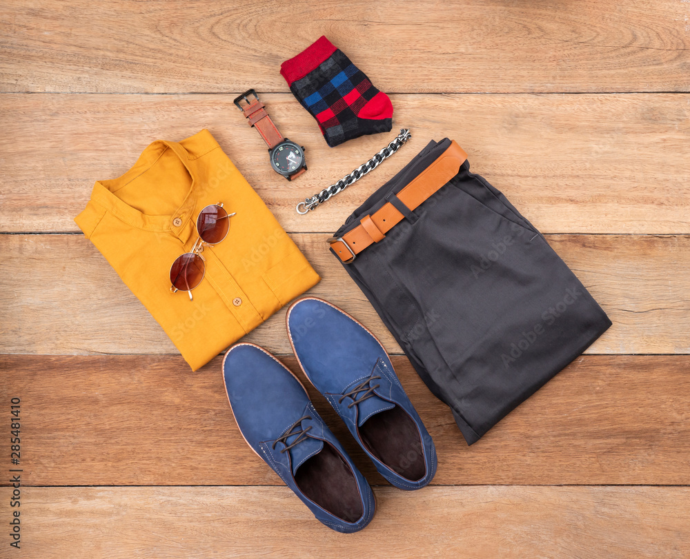 Men Fashion Casual Clothing Set On Wooden Background Include Navy Derby  Shoes, Yellow Shirt, Belt ,Watch, Sunglasses, Sock, Bracelet And Gray  Pants. Flat Lay, Top View. Photos | Adobe Stock