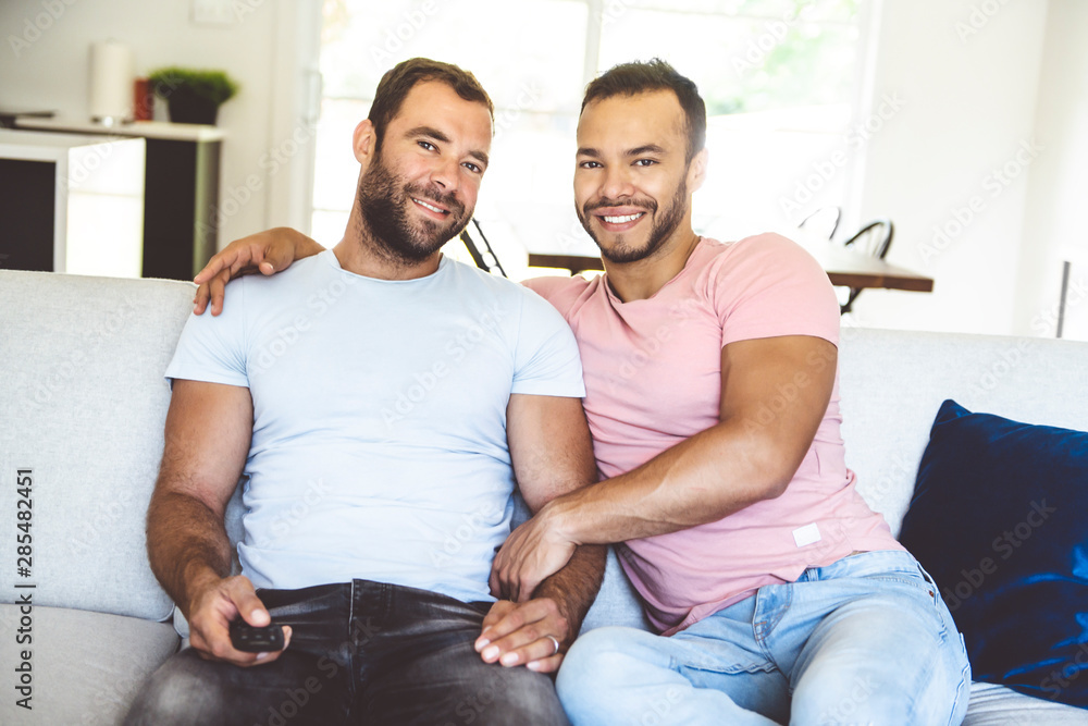 Obraz premium Portrait of a Cute Male gay homosexual Couple at Home