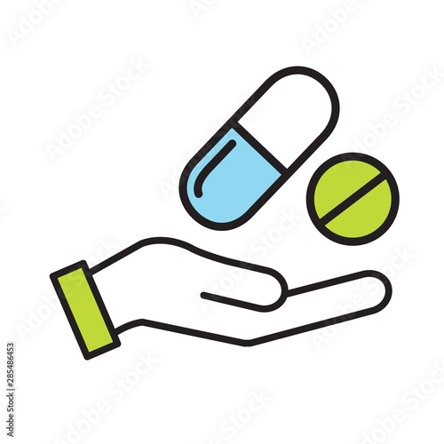 Hand with prescription drugs - pill tablets & capsules