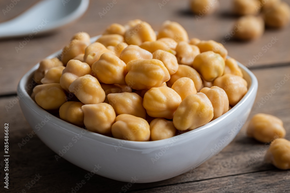 Cooked chick peas in white bowl. Cooked chick peas in white bowl.