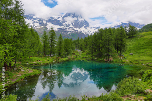 Summer alpine landscape on the Blue Lake (Lago Blu) near Breuil-Cervinia, Aosta Valley, Italy © estivillml