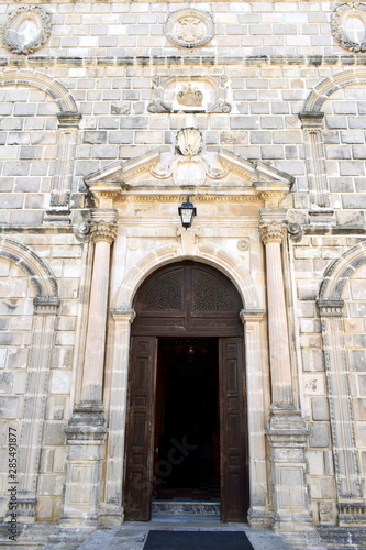 door from stone of a Greek church in Zakynthos island © Panos
