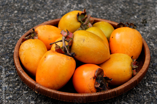 Japanese persimmons in Bamboo basket