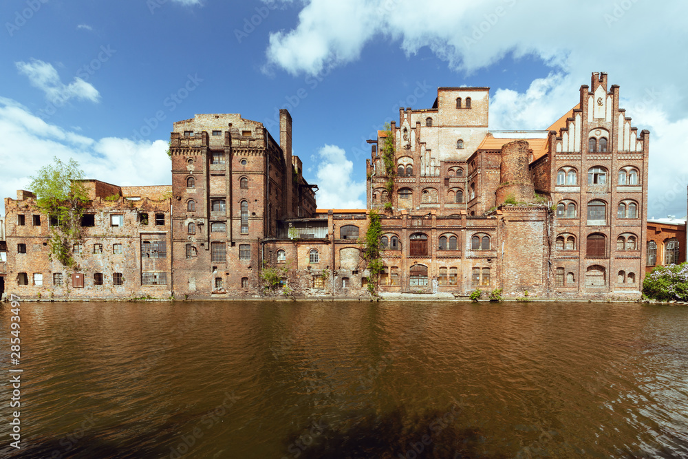 Szczecin. Old abandoned factories on the bank of the Odra river in the old part of town