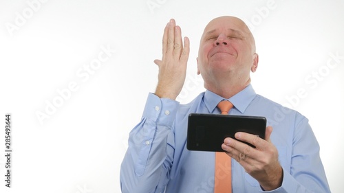 Businessman Read Good News on Tablet and Make Victory Hand Gestures