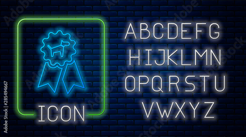Glowing neon Dog award symbol icon isolated on brick wall background. Medal with dog footprint as pets exhibition winner concept. Neon light alphabet. Vector Illustration