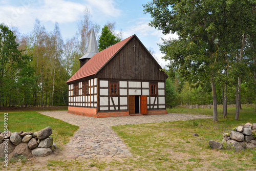 Old church in The Folk Culture Museum in Osiek by the river Notec. Poland, Europe photo