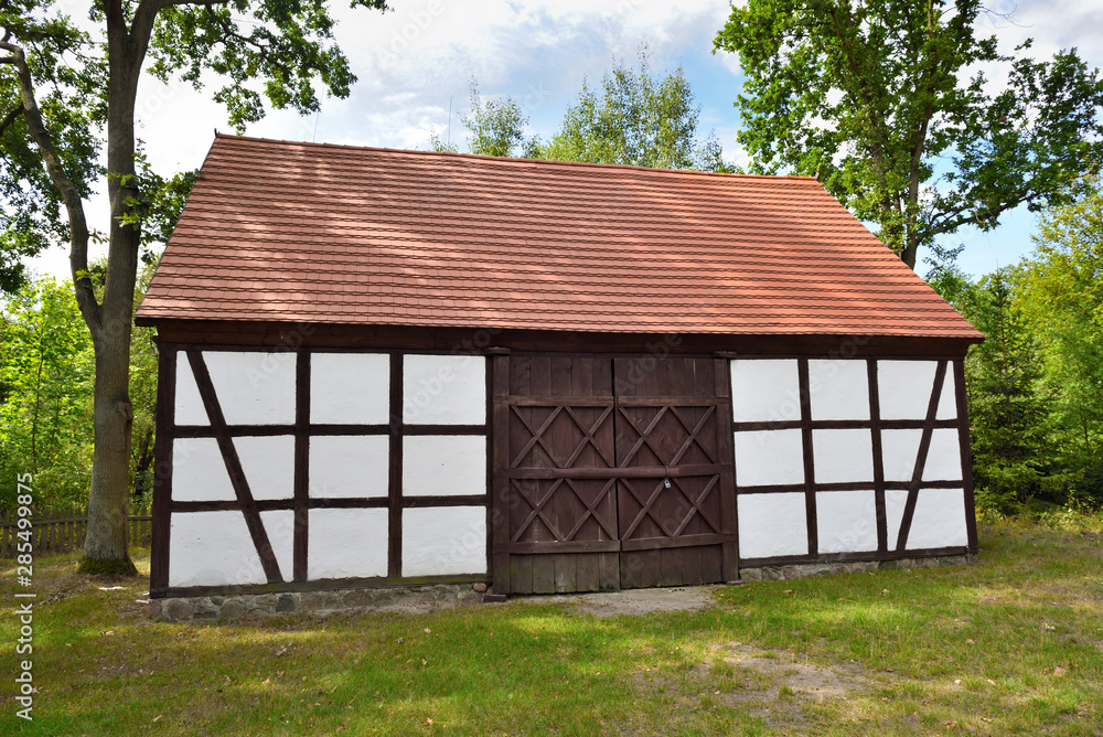 Old whitewashed house in The Folk Culture Museum in Osiek by the river Notec, the open-air museum covers an area of 13 ha. Poland, Europe Old whitewashed house in The Folk Culture Museum in Osiek by the river Notec, the open-air museum covers an area of 13 ha. Poland, Europe