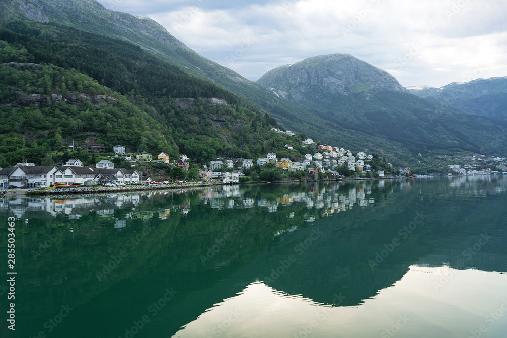 Odda fjords seaside in Hordaland county. Odda is a small village situated innermost in Sørfjorden, an arm of the beautiful Hardangerfjord.