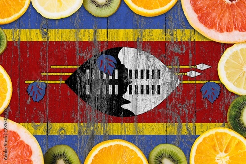 Swaziland food concept. Fresh fruits from traditional gardens. Cooking concept on wooden flag background. photo