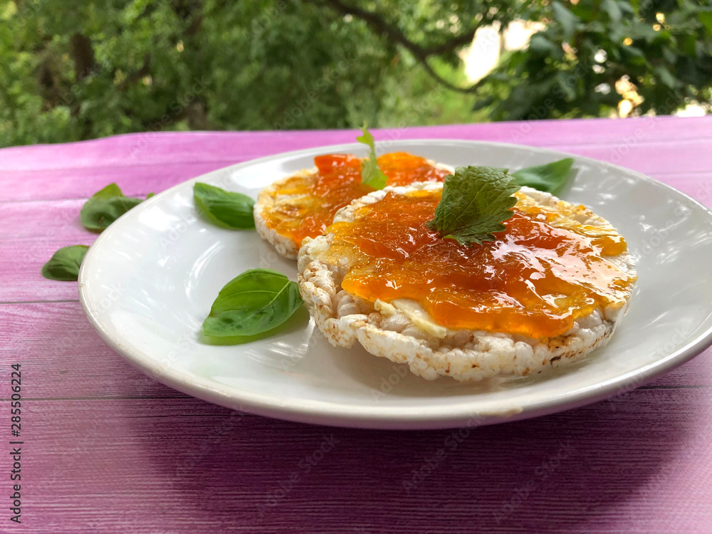 Healthy rice waffles, crispbread or puffed rice snack with apricot jam. Healthy sweet vegetarian snack, dessert or breakfast.
