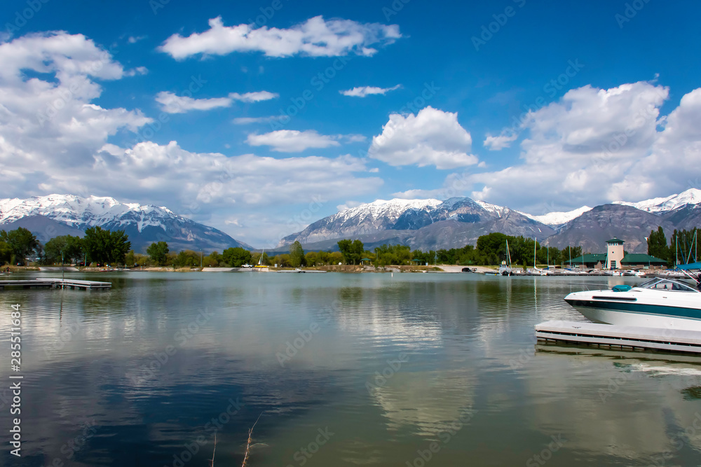 A view of the snow capped mountains as seen from utah lake near Provo