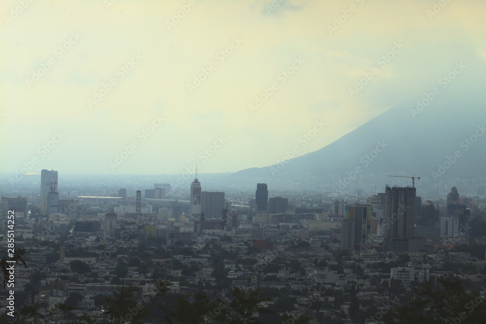 View of the city and buildings on a cloudy day