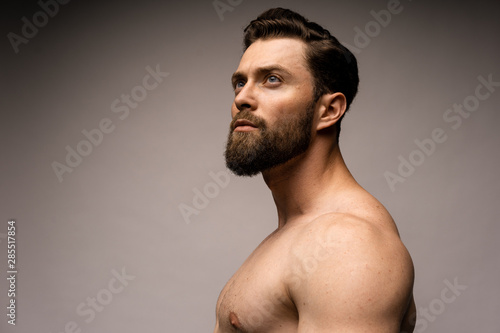 Portrait of sexy man. Good muscles. Nice view.